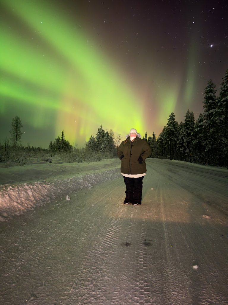 Solo traveller under Aurora